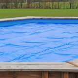 Couverture solaire GRE 400µm pour piscine rectangulaire en bois véritable Marbella 2
